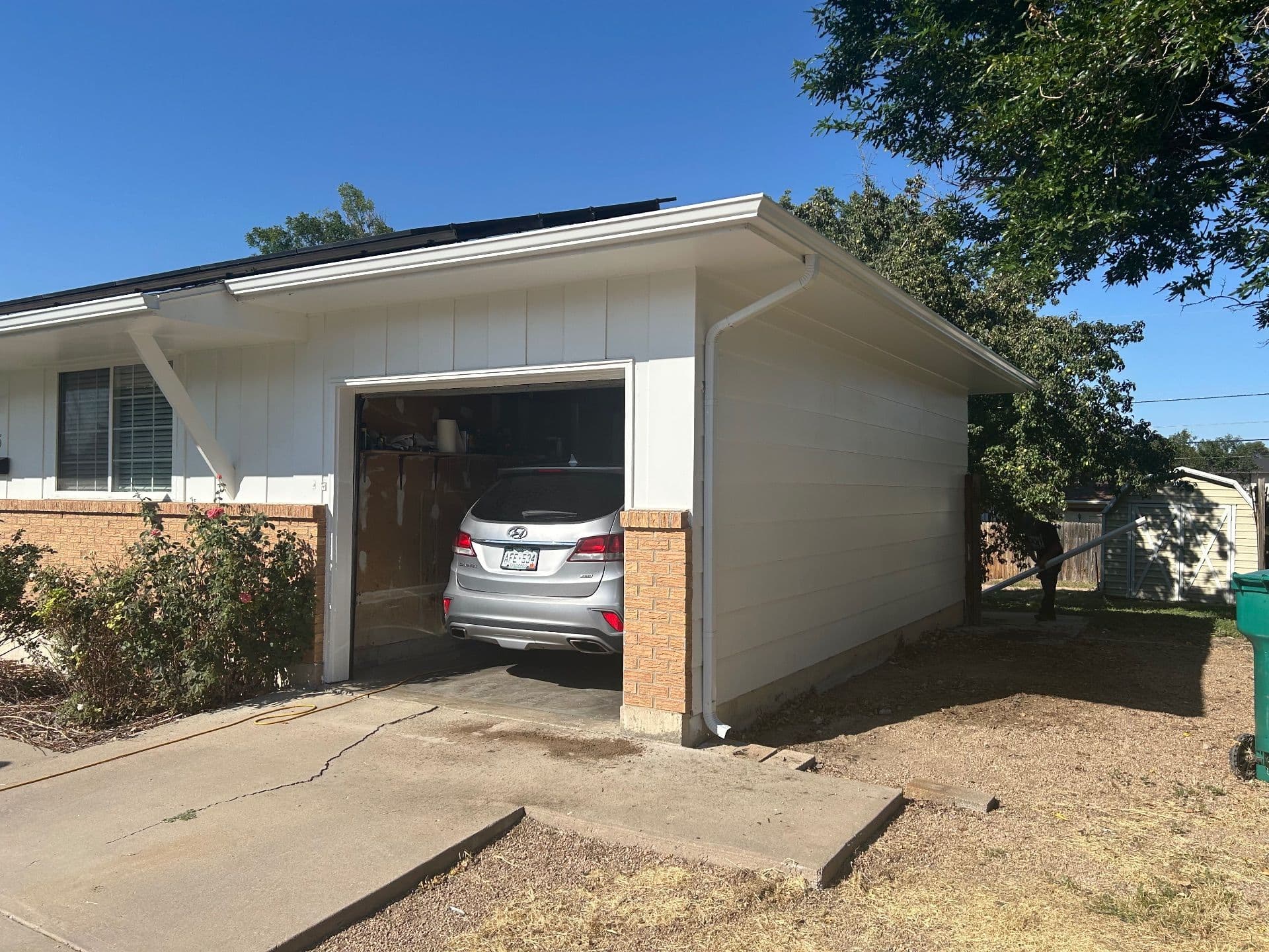 Transformed Home with New Aluminum Gutters image